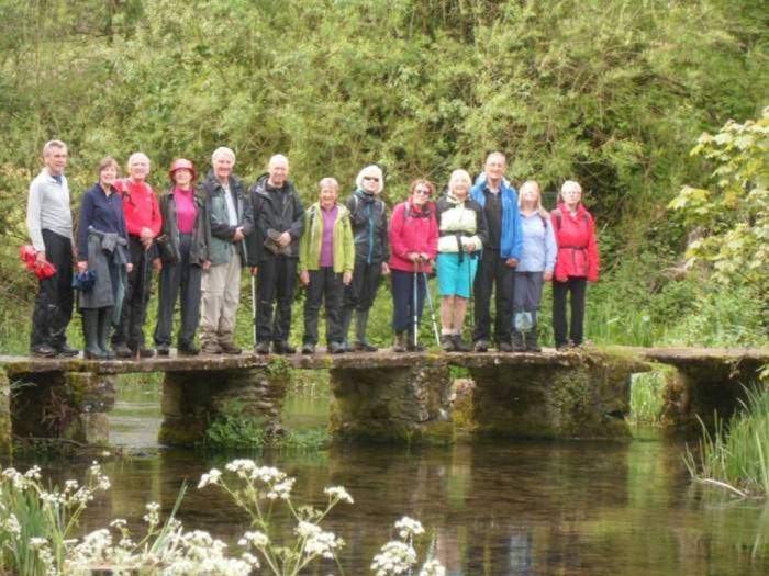 We pose on the clapper bridge over the River Leach, like thousands of tourists before us.
