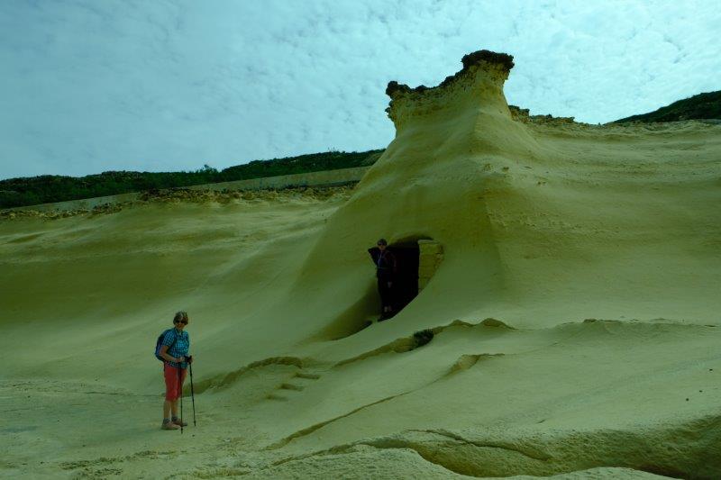 Sandstone cliffs hollowed out to make shelters