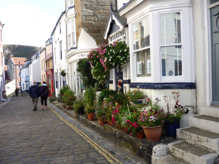 We walk down through Staithes