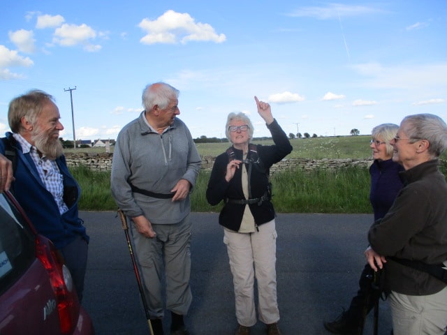 Ann takes the camera for Sally and Keith's walk