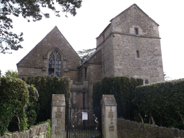 A better view of the church's unusual saddleback tower