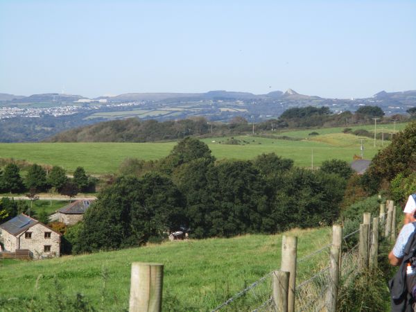 We head on the Saints Way parallel with the coast, Bodmin Moor and St. Austell in the distance