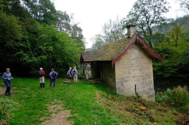 Alex leads us into Woodchester park and the boat house