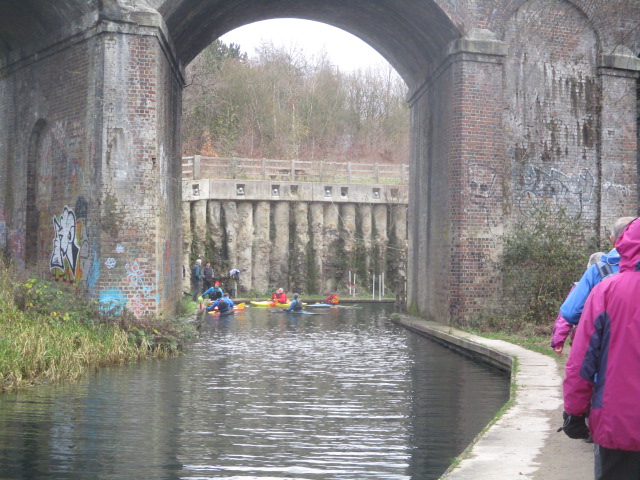 Canoes practising under Capel Mill