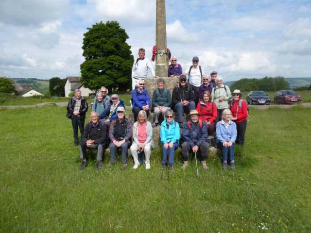 We have composed ourselves into a formal photo at  Amberley war memorial