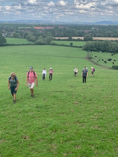 Climbing the lower slope of Coopers Hill