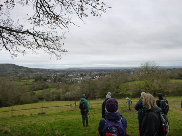 We climb, with views over Charlton Kings